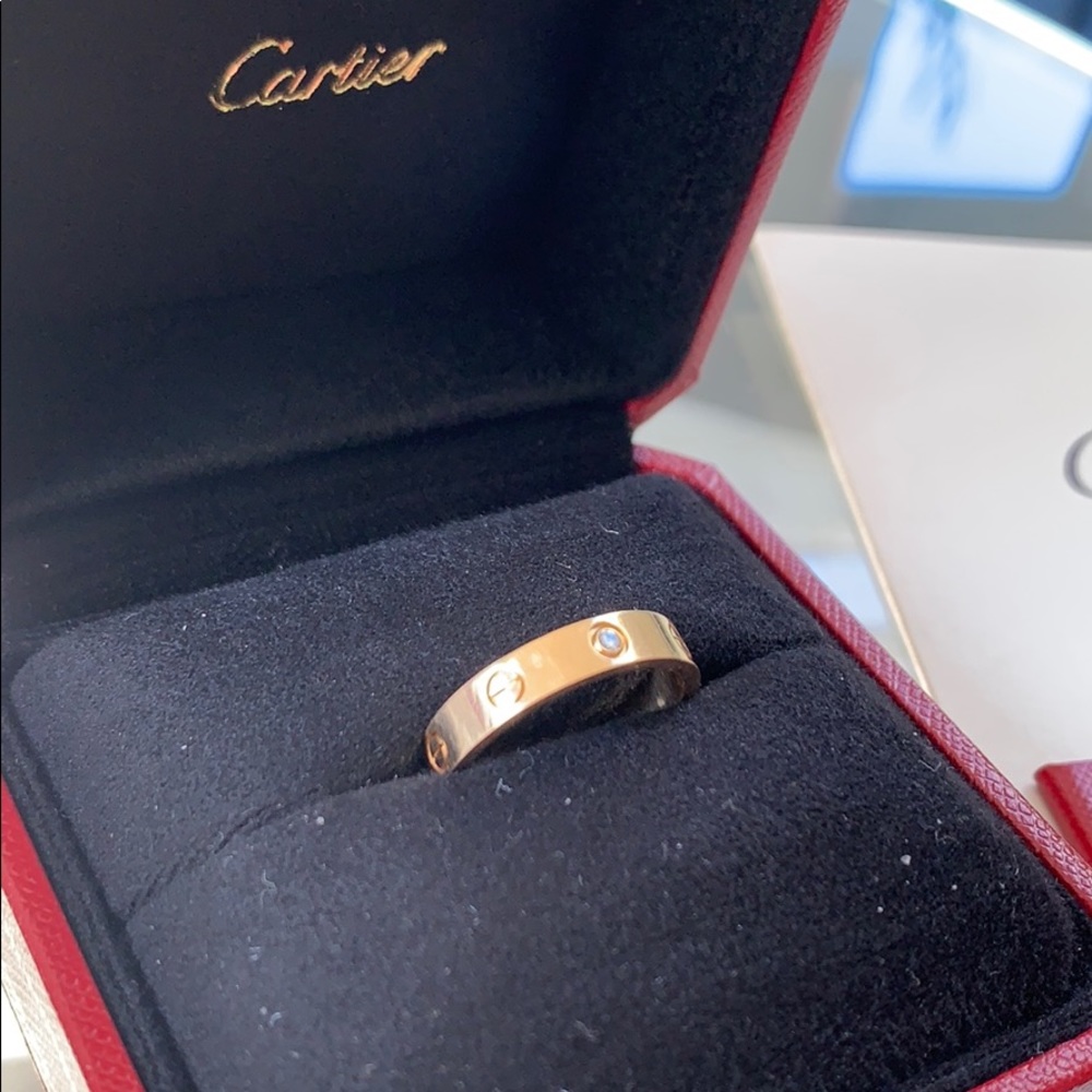 Cartier love ring 18k yellow gold 1 diamond.
